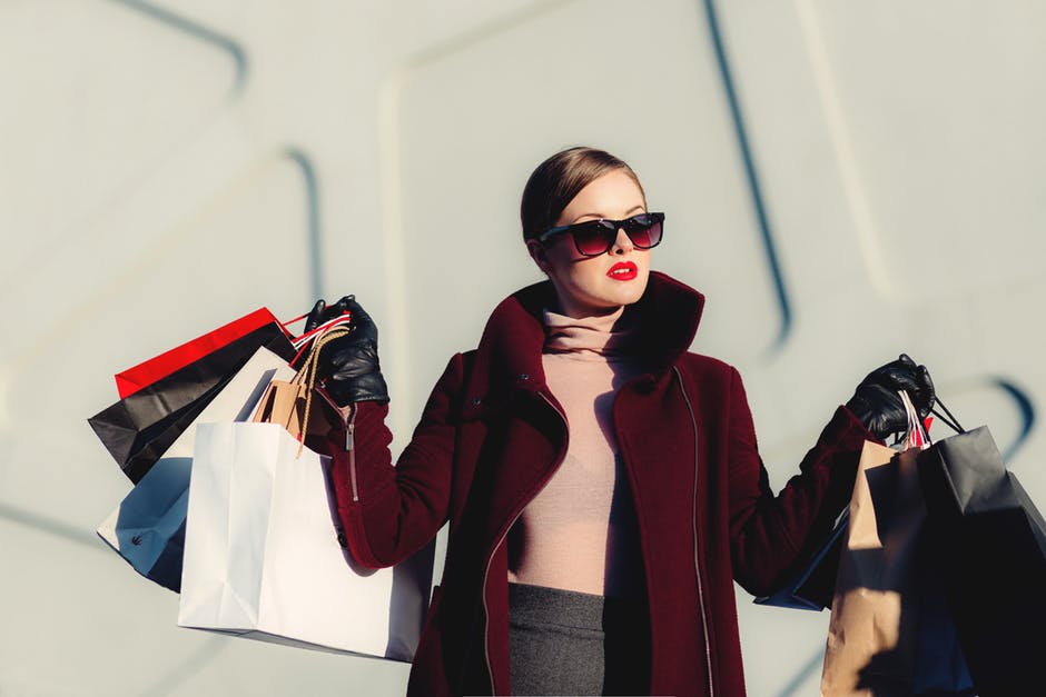 shopping spending woman buying purchasing
